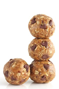 three cookies stacked on top of each other with chocolate chips and oats in the middle