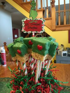 there is a cake made to look like christmas trees with candy canes on top