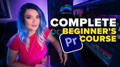 a girl with blue hair is in front of a computer screen that says complete beginner's course