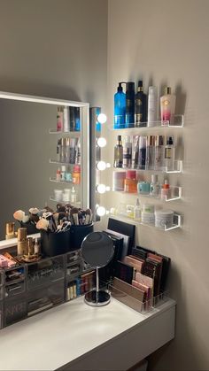 the vanity is full of cosmetics and personal care items