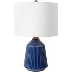 a blue table lamp with a white shade