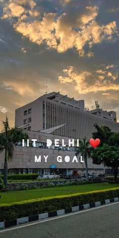 an image of a building that says it's delhi my goal in front of the sky