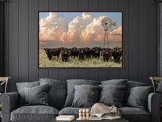 a herd of cattle standing next to each other in a living room