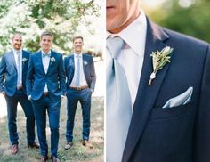 three men in suits and ties standing next to each other, one with a boutonniere on his lapel