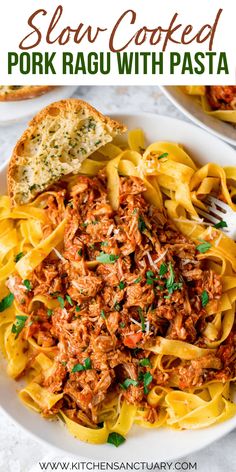 slow cooked pork ragu with pasta in a white bowl on top of a table