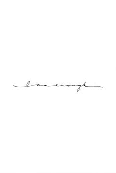 the word love is written in cursive handwriting