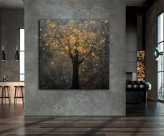 a large painting hanging on the wall in a living room