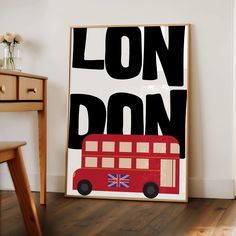 a red double decker bus with the words london on it in front of a white wall