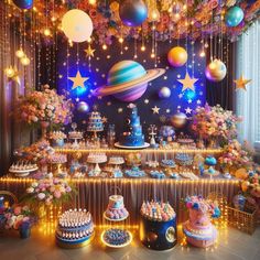 a space themed birthday party with cake, cupcakes and desserts on the table