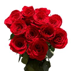 a vase filled with red roses on top of a table