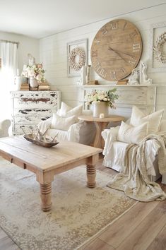 a living room filled with furniture and a large clock on the wall