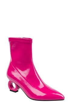 A chic faux-leather bootie fashioned with a pointed toe and architectural heel brings trendy style to your lineup. 2" heel 6 1/2" shaft; 10" calf circumference Synthetic upper/textile lining/rubber sole Imported Spring Pink Heeled Boots With Reinforced Heel, Spring Party Heeled Boots With Sculpted Heel, Chic Pink Heeled Boots With Pointed Toe, Pink Heeled Boots With Reinforced Heel And Pointed Toe, Fall Bold Heeled Boots With Pointed Toe, Bold Pointed Toe Heeled Boots For Fall, Spring Pink Heeled Boots With Pointed Toe, Pink Block Heel Boots For Spring, Spring Pink Pointed Toe Heeled Boots