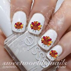 Thanksgiving Nail Art Turkey Nail Water Slides 20 mix water decals in different sizes to fit all your nails! Use: 1-Trim,clean then paint your nails with the color you want. 2- cut out the pattern and plunge it into water for 10 - 20 seconds. (use warm water in winter). 3- moisten the fingernails,stick the pattern in the position you like. 4- sop up the water with a paper towel and blow dry. 5- cap with clear nail polish and blow dry. Turkey Nails, Fox Nails, Nail Art Halloween, Thanksgiving Nail Designs, Nail Water Decals, Thanksgiving Nail Art, Thanksgiving Nail, Finger Nail Art, Pumpkin Nails