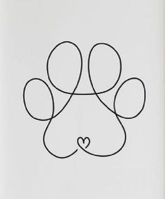 a dog's paw with a heart drawn on the back of it in black ink