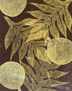 an image of some leaves and fruit on a black background with gold foiling in the middle