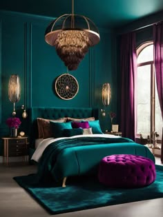 a bedroom decorated in teal and purple with a chandelier hanging over the bed