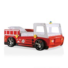 a red fire truck bed with white sheets