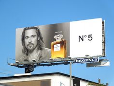 a billboard with a man's face on it and the number 15 in front