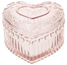 a clear glass heart shaped box on a white background