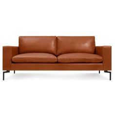 a brown leather couch with black legs and armrests on an isolated white background