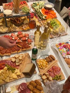 a table filled with lots of different types of food