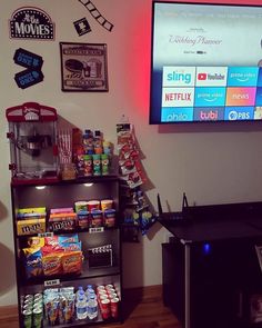 a television and some snacks on a stand