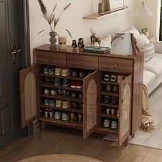 a living room filled with furniture and lots of shoes