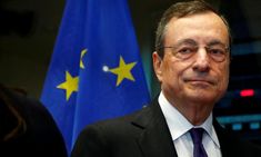 a close up of a person wearing a suit and tie with european flags in the background