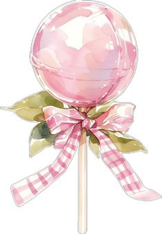 a pink lollipop with a bow on top