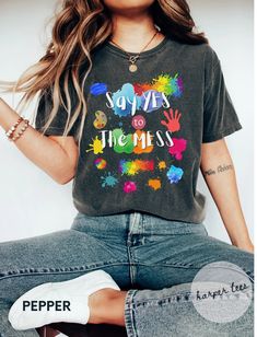 Our Say Yes to The Mess artist shirt is great for art teachers or just anyone who loves to say yes to the mess! This Comfort Colors tshirt is guaranteed softness. ❤︎ SHIRT QUALITY Comfort Colors Tee 100% ring-spun cotton Medium fabric Relaxed fit Soft washed garment Highly Durable ❤︎ PRINT QUALITY We use Direct to Garment Printing with high quality ink. Colors shown on your monitor may differ slightly from the actual item. ❤︎ SIZING Adult Unisex Comfort Colors Shirt: Please refer to the size cha Art Teacher Tshirt, Art Club Tshirt, Art Teacher Shirt, Art Club Shirt, Art Teacher Shirts, Art Teacher Outfits, Teacher Shoes, Art Tshirt, Artist Shirts