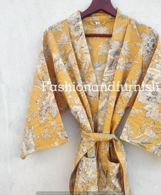 ITEM DESCRIPTION:These Cotton Floral Print Robes are luxurious and sweet, and will make you and your bridesmaids feel like you’re blossoming flowers !These robes are perfect for bridesmaids gifts, birthday gifts, and perfect gifts for girls who are in college.A beautiful lightweight cotton kimono-style hand-printed dressing gown. The gown is 100 cms length and 120 cms wide / bust approx. Features two front pockets, belt and loops.This soft cotton fabric is from India. Fabric has soft touch.Measu Kantha Pillow Covers, Embroidery Kimono, India Fabric, Yellow Outfit, Cotton Kimono, Womens Kimono, Bridesmaid Robes, Kimono Cardigan, Kimono Dress