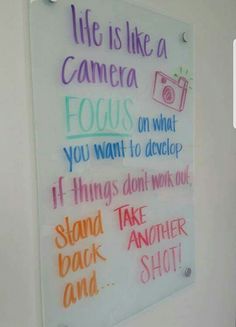 a white board with writing on it that says life is like a camera focus you want to develop if things don't work out, take another shot