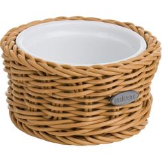 a wicker basket with a white bowl in it