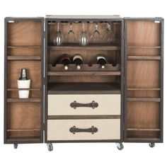 an open cabinet with wine glasses on it