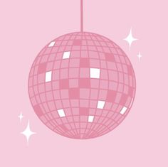 a pink disco ball hanging from a string