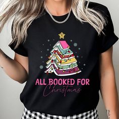 All Booked For Christmas Shirt,Christmas Tree Book T Shirts,Bookworm Christmas Shirt, Book Lovers Gift,Librarian Book Christmas Shirt 🌟 **Welcome to LazTeeApparel 🌟 **Product Details Delve into our selection of trendy t-shirts, ideal for both football lovers and fashion enthusiasts. We utilize premium Bella Canvas and Gildan SoftStyle shirts to ensure exceptional quality. **Bella Canvas 👕 Universal unisex sizing 🌟 Lightweight at 4.2 oz for optimal comfort 🔄 Offered in multiple fabric blends, including 100% Combed Cotton, Ring-Spun Cotton, and Polyester mixtures **Gildan SoftStyle 👕 Unisex fit for versatile wear 🔄 Available in various fabric compositions such as Ring-Spun Cotton, Polyester blends, and 100% Ring-Spun Cotton We use the DTF (Direct to Film) printing technique, deliverin Universal Christmas Shirts, Book T Shirts, Christmas Tree Book, Book Christmas, Book Tshirts, Football Lovers, Book Shirts, Trendy Tshirts, Lovers Gift