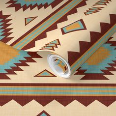 an image of a southwestern style wallpaper with brown, blue and tan colors on it