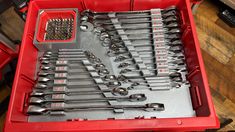 a red tool box filled with lots of tools