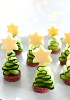 cucumber and cheese christmas trees on a plate