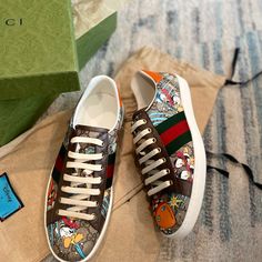 Gucci Disney X Gucci Donald Duck Ace Sneaker 647950 Limited Edition. See As A Picture. Brand New With Tag, Dust Bags And Organic Box. Gucci X Disney Gg Supreme Donald Men’s Sneakers Italy Size Uk 6.5 Authentic Gucci X Disney Men’s Sneakers. Model: 647950 2m110 Color: Beige / Ebony New With Box Details: Part Of The Gucci X Disney Collaboration. Low-Top Coated Canvas Sneakers In Brown Featuring Gg Supreme Throughout. Round Toe. Lace-Up Closure In Off-White. Signature Web Stripe In Red And Green At Gucci Donald Duck, Gucci High Top Sneakers, Gucci High Tops, Silver Sneakers, Dog Shoes, Disney Men, Gucci Men Shoes, Leather High Tops, Fresh Kicks