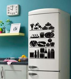 a white refrigerator freezer sitting inside of a kitchen