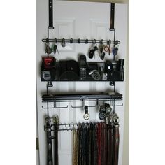 a wall mounted rack with many items on it