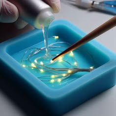 Do you want to add an intriguing and elegant touch to your art by embedding LEDs in resin but don't know where to begin? The following steps will guide you in turning your creative aspirations into reality, and crafting unique and impressive pieces. Let's explore how to embed LEDs in epoxy resin to create illuminating […] Resin Crafts With Lights, Epoxy Silicon Mold, Resin Lights Diy, Using Resin In Crafts, Diy Resin Molds Ideas, How To Make A Resin Mold, How To Layer Resin, Creative Resin Ideas, Epoxy Resin Lamp Diy