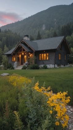 a house is lit up in the evening