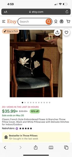 an image of a chair with flowers on the back and in front of it that is for sale