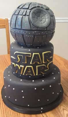 three star wars themed cakes stacked on top of each other