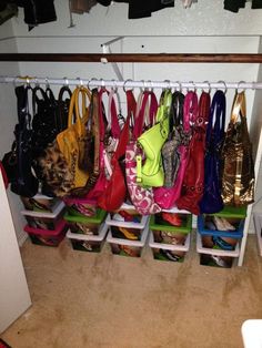 the closet is filled with purses and handbags