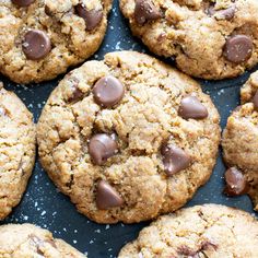 chocolate chip cookies on a baking sheet ready to be eaten