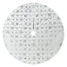 a white and silver snowflake christmas tree skirt