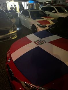 several cars are parked in a parking garage